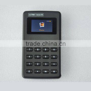 Magic Calculator With MP4 Function Has EBook, Photo, Music, Video, Recorder, FM Radio, Emergency Button to Back to Calculator photo-2