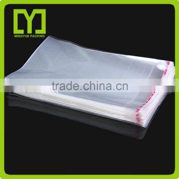 Yiwu factory clear OPP plastic header bag with self adhesive tape made in China