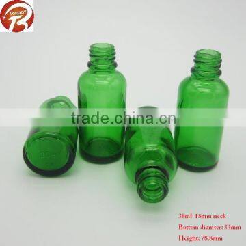 green essential oil glass dropper bottle