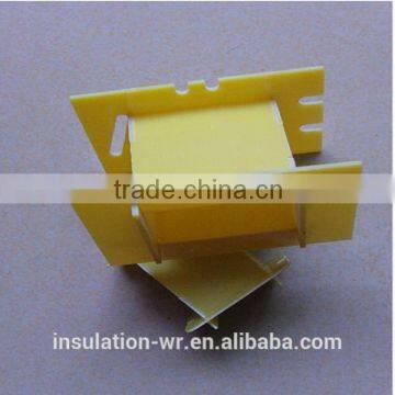 Transformer skeleton for coil winding glass-fiber laminated sheet