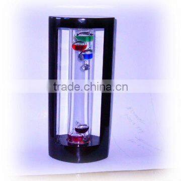 glass weather galileo thermometer with metal