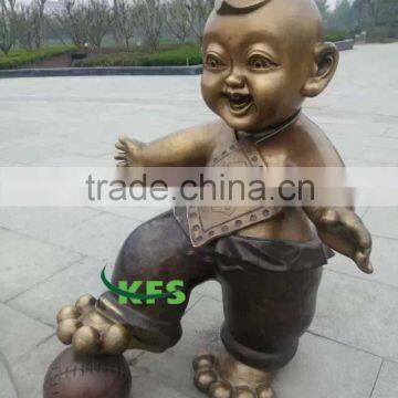 Bronze funny boy playing with ball sculpture