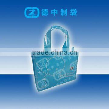 Blue color Non woven gusset bags with simple logo printed