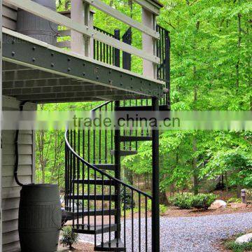 villa black iron spiral stair with checkered plate steps and vertical tube railing