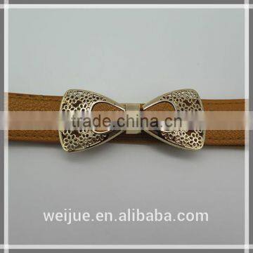 Fashionable elastic belt with alloy carved bowknot for women