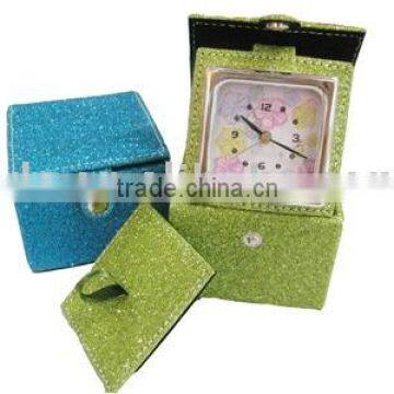 Travel alarm clock with fashion leather cosmetic pocket