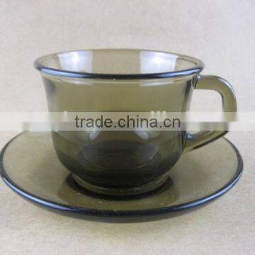 Glass cup and saucer/glassware