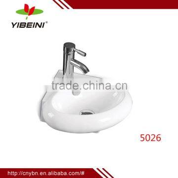 ceramic corner wall hung wash basin price manufacturer