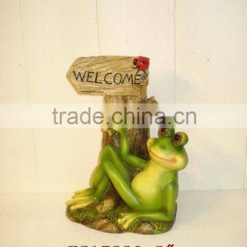 Resin Frog figurine on beach