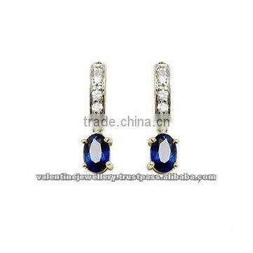 small 6x4 oval sapphire and diamonds drop earring in white gold