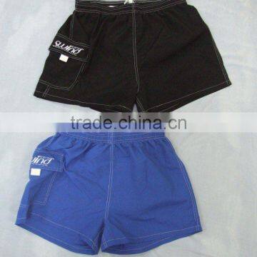 100% polyester peach sking fabric,men's shorts with elasticated waist,side pocket with logo.