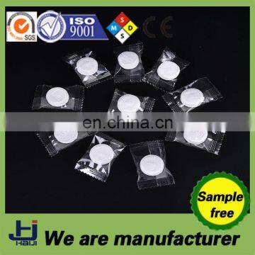 Compressed dry magic coin tissue with candy package