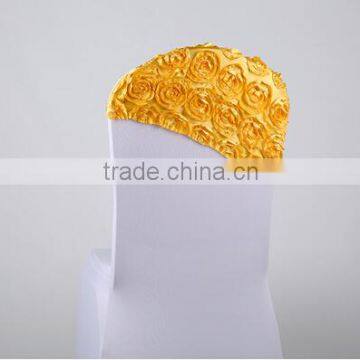 white spandex chair cover with yellow rosette cap for weddings