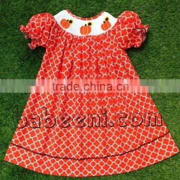Lovely sunflower and pumpkin hand smocked bishop dress
