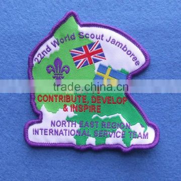 iron on woven badge with embroidered border