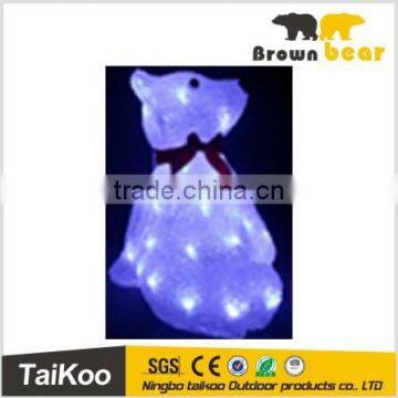 bear propel on the ground with one hand for christmas street light decoration