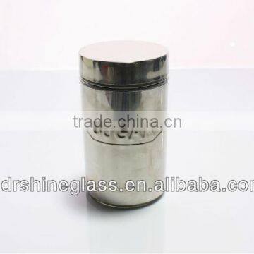 glass storage jar with iron cover