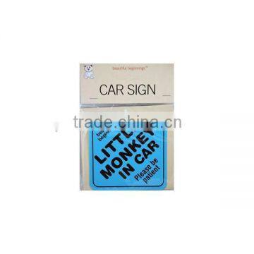 clearly visible little monkey in car caution sign (M-CS059)