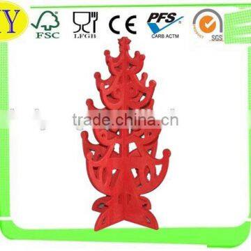 red color christmas tree wood