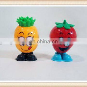 plastic funny wind up jumping fruit toy