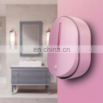 Hotel sensor pumps pink soap dispenser