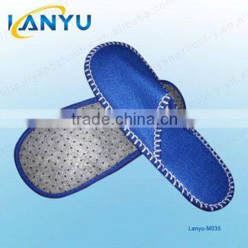 Anti-slip felt slippers with dots outsole