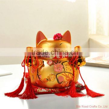 Maneki neko interior decoration with glod small bell