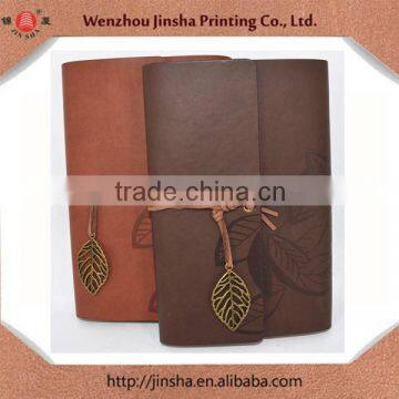 embossed logo and pu leather notebook 2015 stylish leather hardcover loose leaf type with leather rope and copper leaf