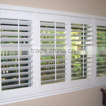 white wooden window shutter