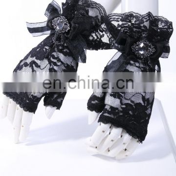 Gothic laced fingerless gloves with double bow and brooch