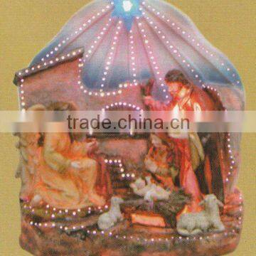 Religious figurine with optic fiber