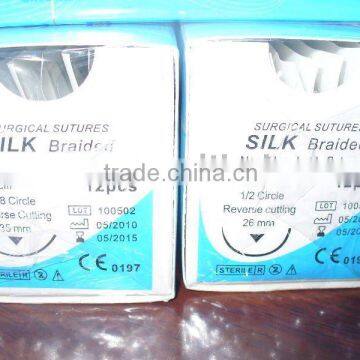 Surgical silk suture with needle