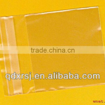 clear opp bag with self-adhesive gule