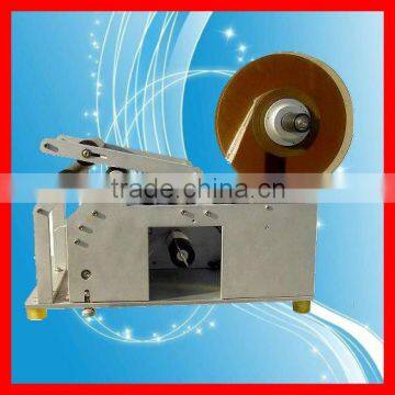 manual adhesive labeling machine