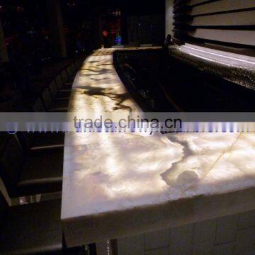 NATURAL STONE BACKLIT ONYX COUNTERTOPS FOR BAR RECEPTIONS photo-5