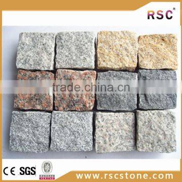 Bush hammered granite paving stone pattern