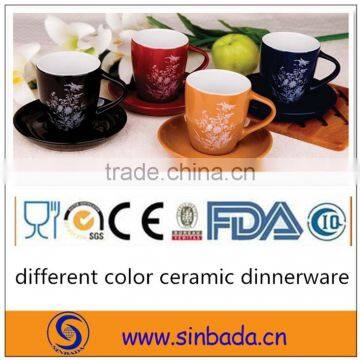 glazed color ceramic stoneware cup and saucer with decal