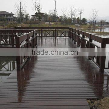 wood outdoor railing/fence rail around river