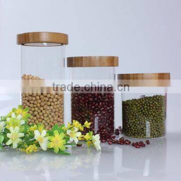 Household glass food storage container with wood lid