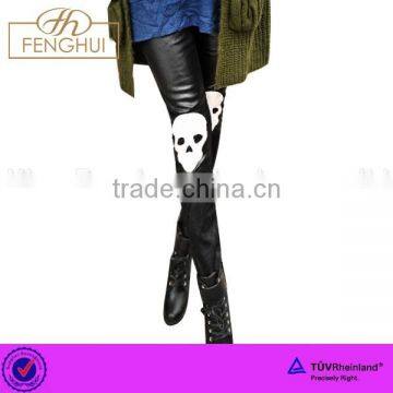 The winter skull pattern imitation leather stitching leggings