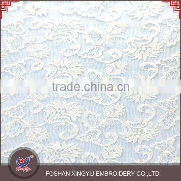 2015 New design hot sale white transparent mesh lace embroidered tulle fabric for wedding dress