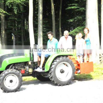 mini farm tractor for sale with front loader 4in1 bucket and backhoe,4cylinders,8F+2R shift,with Cabin,heater,fan,fork,blade