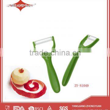 green plastic handle ceramic potato peeler as seen on tv