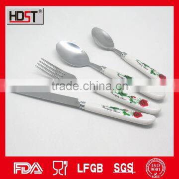 Low price promotion cutlery;wholesale 18/0 stainless steel popular ceremic handle flatware set