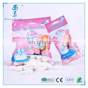 2017 fashion color bag pack mini magic coin compressed napkin tissue wholesaler in China