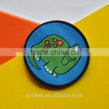 laser cut woven patch with cartoon image