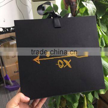 China custom black cardboard gift paper packaging boxes with gold foil logo