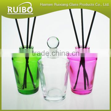 Glass bottle factory 100ml fancy diffuser glass bottle with rattan reeds and glass lid