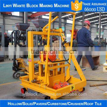 low price small moveable manual hollow block making machine