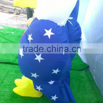 PATRIOTIC INFLATABLE 6' UNCLE SAM HOLDING AMERICAN FLAG WITH BALD EAGLE